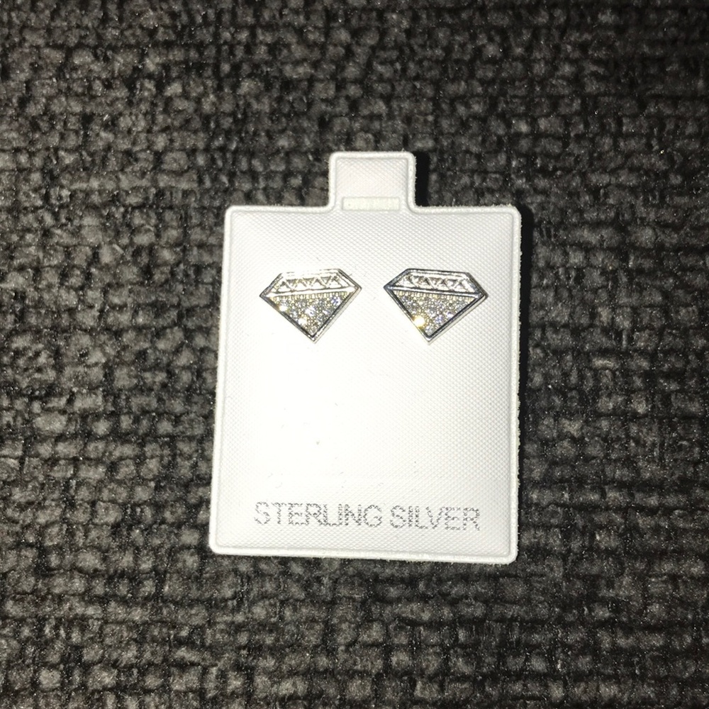 Sterling silver diamond shaped earrings.